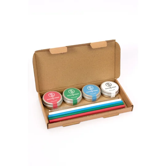 Inside a silicone straw gift set. Reusable silicone straws in travel tins
