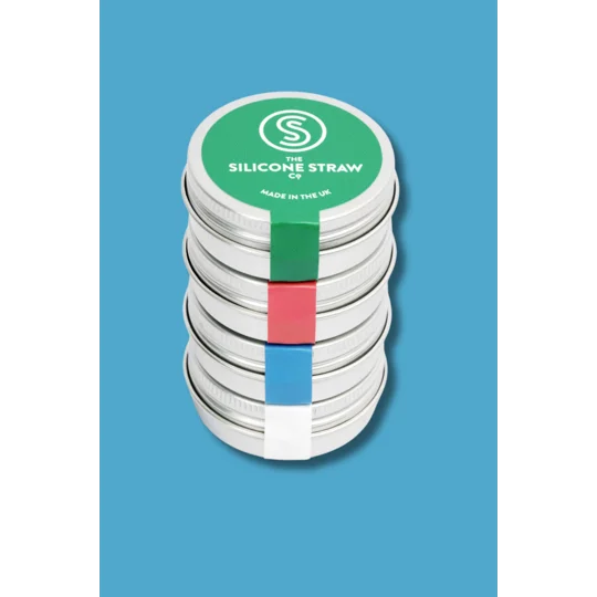A colourful image of silicone straws in a carry case stacked on top of one another