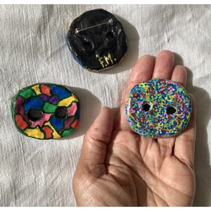 Giant buttons brooches