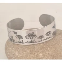 Bee and Daisy stainless steel cuf..