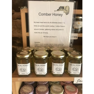 Local comber Honey (8oz)