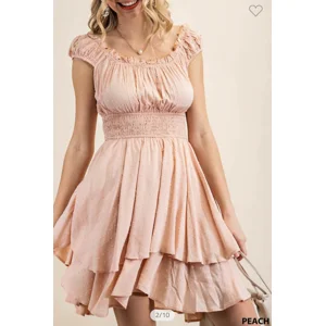 Peach color Swiss dot dress.