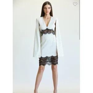 Stripe woven fabric cape dress.