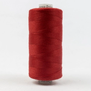 Red sewing thread spool.