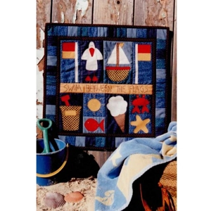 Front cover of craft pattern for a mini quilt featuring a seaside theme.