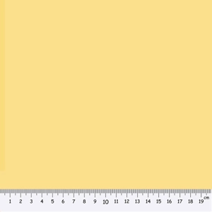 Swatch of homespun fabric in butter yellow.