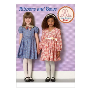 Sewing pattern cover showing girls gathered dresses in short and long sleeves.
