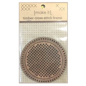 Circle shaped timber cross stitch frame.