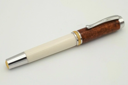SR1 rollerball in synthetic ivory and amboyna burr SR1 rollerball in synthetic ivory and amboyna burr