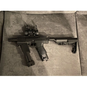 Left view of CymruTec FSC Paintball Carbine Kit showing foregrip, compensator and stock
