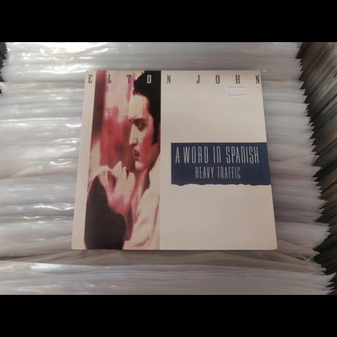 Elton John - A word in Spanish 7"