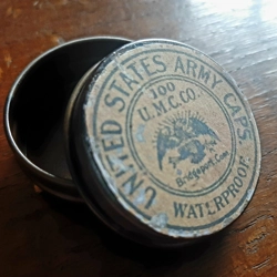 U.M.C Percussion cap tin aged