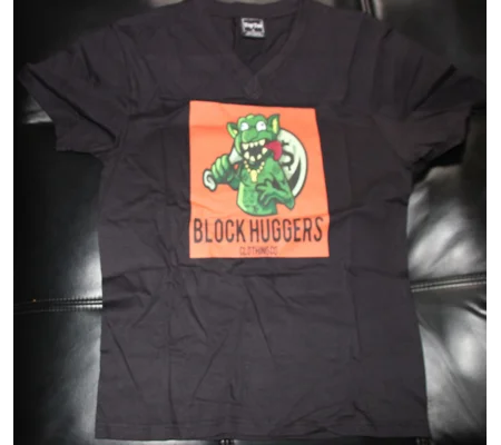 Block Huggers Clothing Bag Chasing Monster Tee black and orange