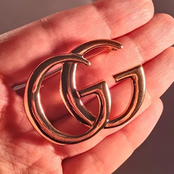 Gucci Logo Gold Brooch ..
