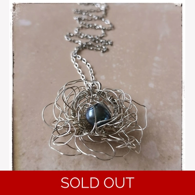 Silver crochet flo..