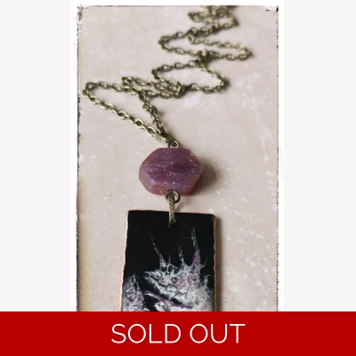 Ruby and black pen..