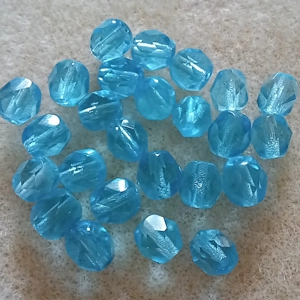 25, 6mm fire polished crystals transparent light turquoise blue