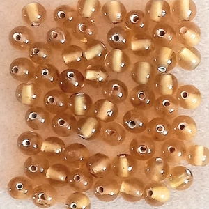 60, 7mm handmade Indian glass beads, transparent amber