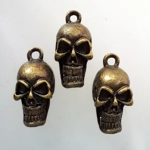 3, antique gold skull pendants, 10mm x 20mm