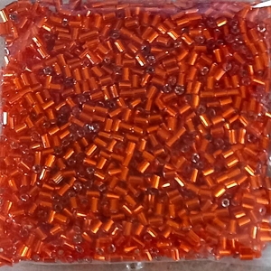 20g, 2mm bugle beads, silverlined orange