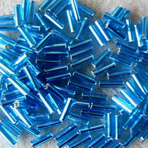20g, 7mm bugle beads, silver-lined aqua