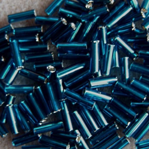 20g, 7mm bugle beads, silver-lined dark turquoise blue