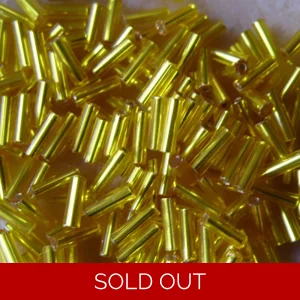 20g, 7mm Czech glass bugle beads, silver-lined yellow
