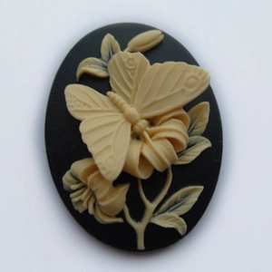 Butterfly cameo, 40mm x 30mm black and cream