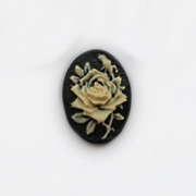 Rose cameo, 18mm x 13mm, black and cream.
