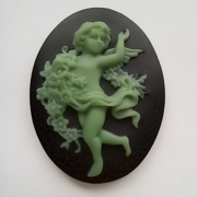 Cherub cameo, 40mm x 30mm black and aquamarine