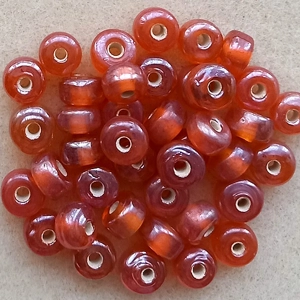 40 glass drum beads, lustered orange, 7mm x 5mm