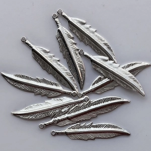 10, silver plated feather pendants, 35mm x 8mm