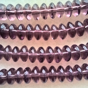 40 transparent amethyst glass saucer beads