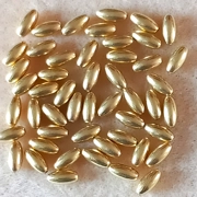 50 plated metal beads, 3mm x 7mm oval light gold