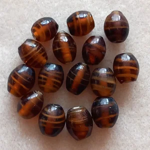 15, topaz, striped Indian glass beads, oval 12mm x 10mm