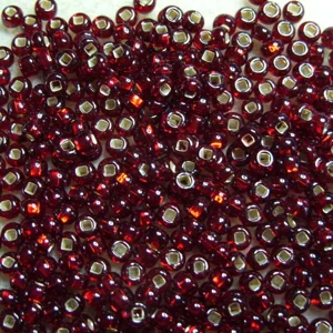 20g, size 6 seed beads, silverlined dark red