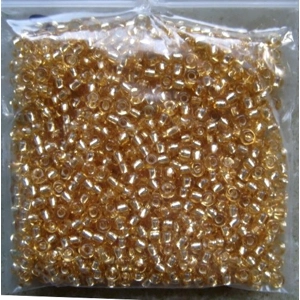 20g size 8 seed beads, silverlined pale gold