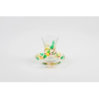 Enjoy your tea from beautifully decorated pear-shaped cups..