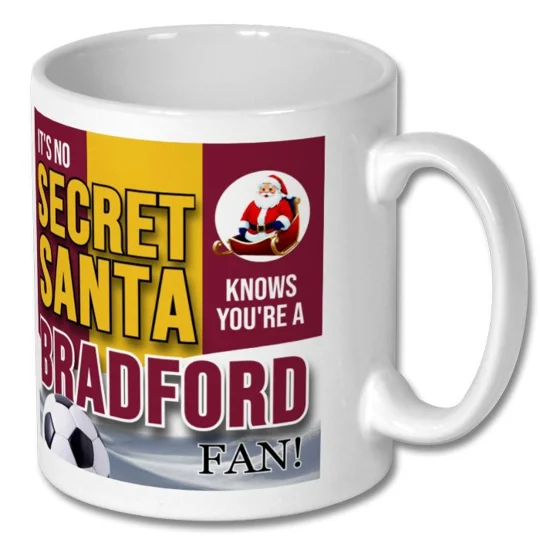 Close-up of the Bradford-inspired football artwork on a white ceramic Christmas mug
