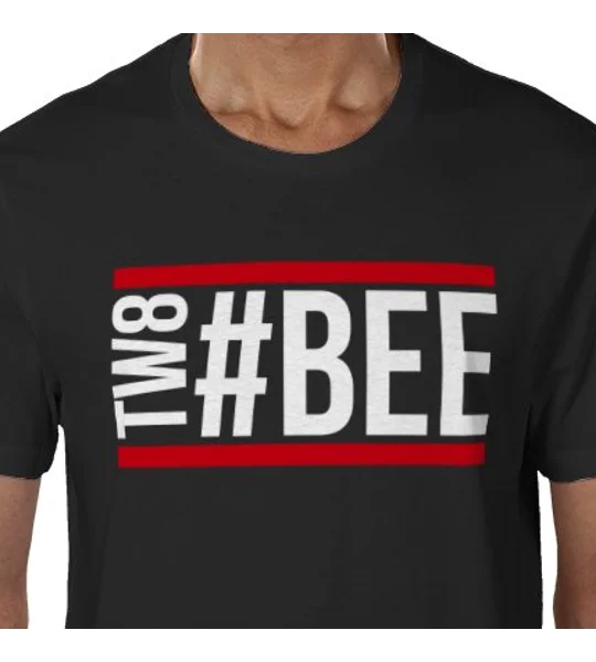 Black Bee Hashtag football fan shirt — Close-up product image of a black T-shirt with a large white “#BEE” and vertical “TW8” chest design, accented with vivid red stripes.