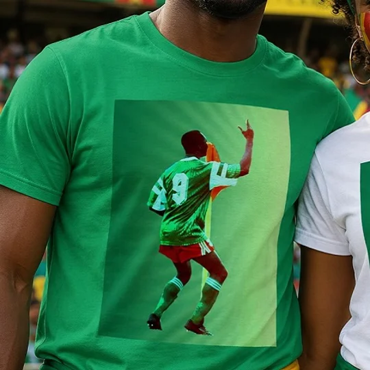 Roger Milla-inspired Cameroon 1990 World Cup green T-shirt with full-colour football legend artwork