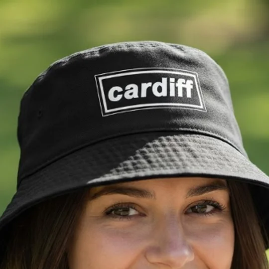 Close-up of the Cardiff-inspired retro bucket hat showing its printed design and wide brim