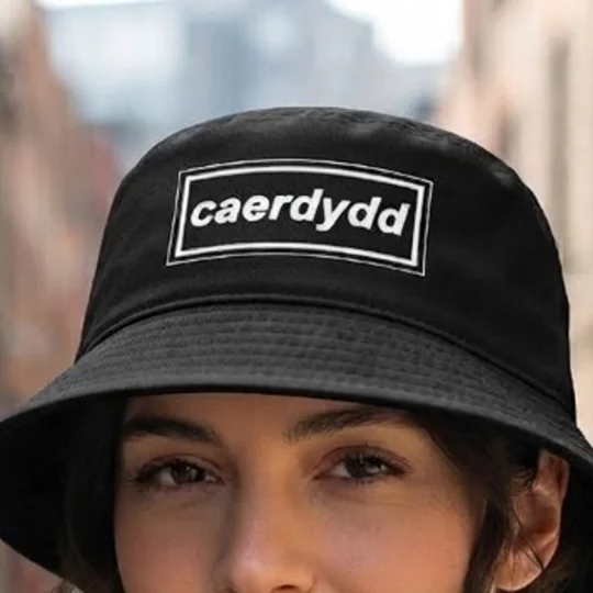 Black Cardiff Caerdydd retro 90s-style bucket hat featuring a Cardiff-inspired full-colour printed design