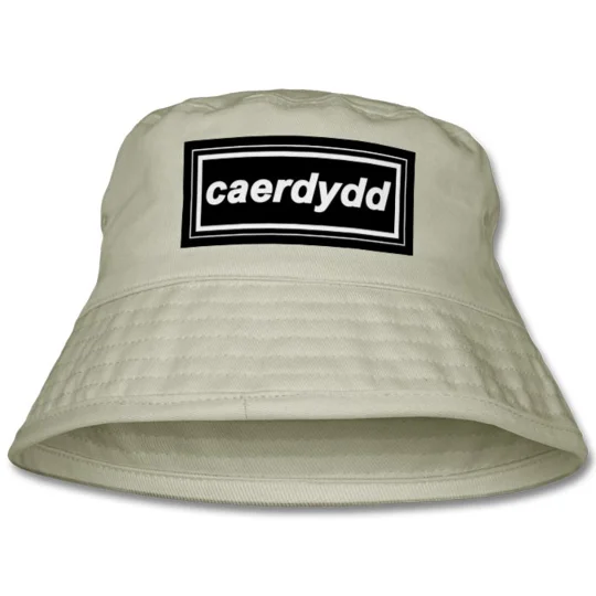 Sand-coloured Cardiff-inspired retro bucket hat showing its wide brim and distinctive 1990s-style design
