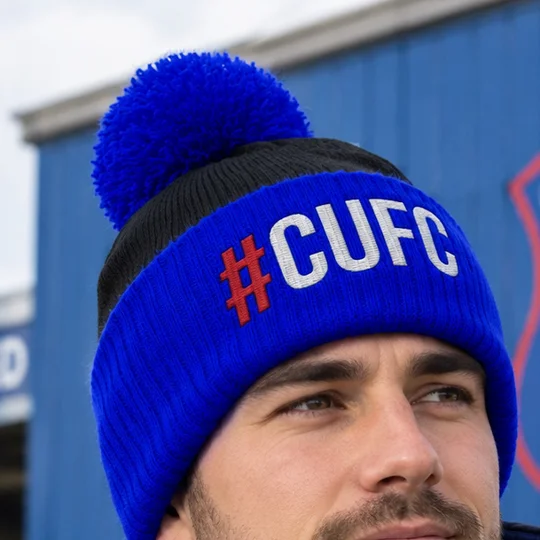 Carlisle-Inspired Hashtag bobble hat with embroidered detailing in retro football beanie style