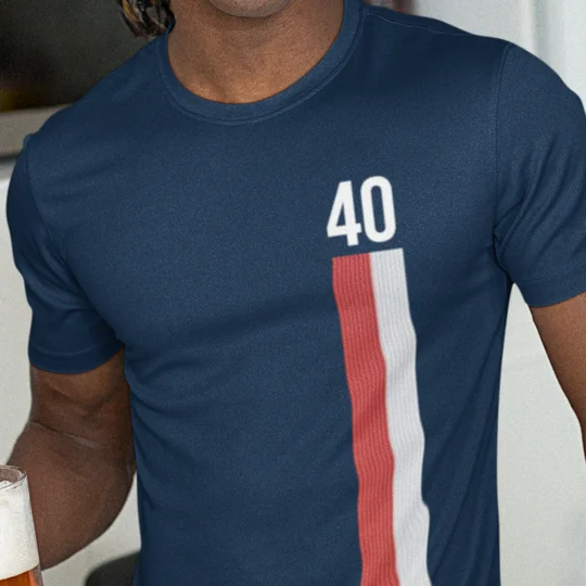 Front view of the Escape to Victory 40th Anniversary retro blue cotton T-shirt featuring colourful film-inspired artwork.