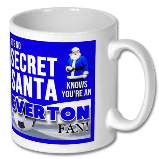 Close-up of the Everton-inspired football artwork on a white ceramic Christmas mug
