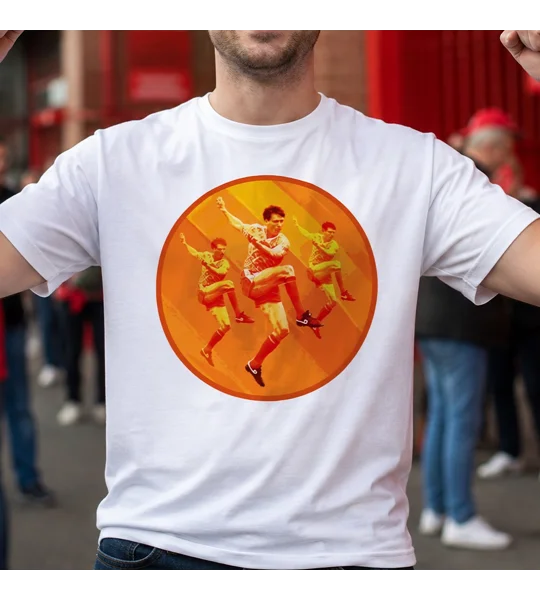White football T-shirt featuring a retro orange and yellow football player design, modelled by a fan outside a stadium