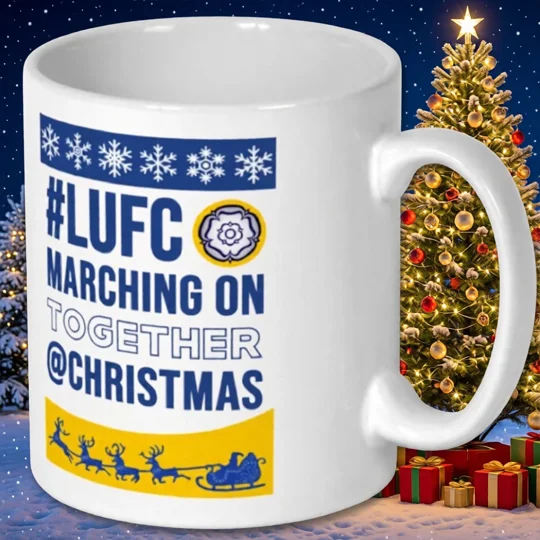 Leeds United-inspired Marching on Together Christmas mug featuring full-colour football artwork on a white mug