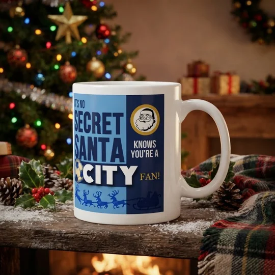 Man City-inspired Secret Santa Christmas gift mug with full-colour football artwork on a white 10oz mug